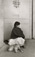 <em>Untitled (Barefoot Girl Holding Dog),</em>c. 1950s/1960s<br />Gelatin silver print<br />Image: 11 7/8 x 7 1/4"