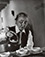 Todd Webb (1905 - 2000)<br><em>Georgia O'Keeffe Pouring Tea at the Ghost Ranch</em>, 1962</br>Vintage gelatin silver print