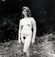 Diane Arbus (1923 - 1971)<br><em>Young Girl at a Nudist Camp, Pennsylvania</em>, 1965</br>Gelatin silver print</br>Image: 14 1/2 x 14 1/4"; Paper: 19 7/8 x 16"