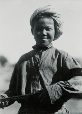 <em>Untitled (Boy in Turban)</em>, nd<br>Gelatin silver print</br>Image: 4 1/4 x 3 1/8"; Paper: 5 1/2 x 3 1/2