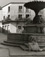 <em>Untitled (Elderly Woman Next to Fountain),</em>c. 1950s/1960s<br />Gelatin silver print<br />Image: 12 1/4 x 9 3/4"