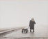 <em>Untitled (Woman pulling wagon),</em> nd<br />Vintage gelatin silver print<br />Image: 7 5/8 x 9 1/2"; Mount: 8 x 10"