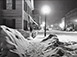 Marion Post-Wolcott<br><em>Main Street of Woodstock VT at Night After Blizzard</em>, 1940, printed 1977</br>Gelatin silver print<br>Image: 6 3/4 x 9"